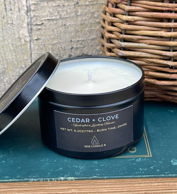 Cedar + Clove 6 oz Soy Candle in Black Travel Tin
