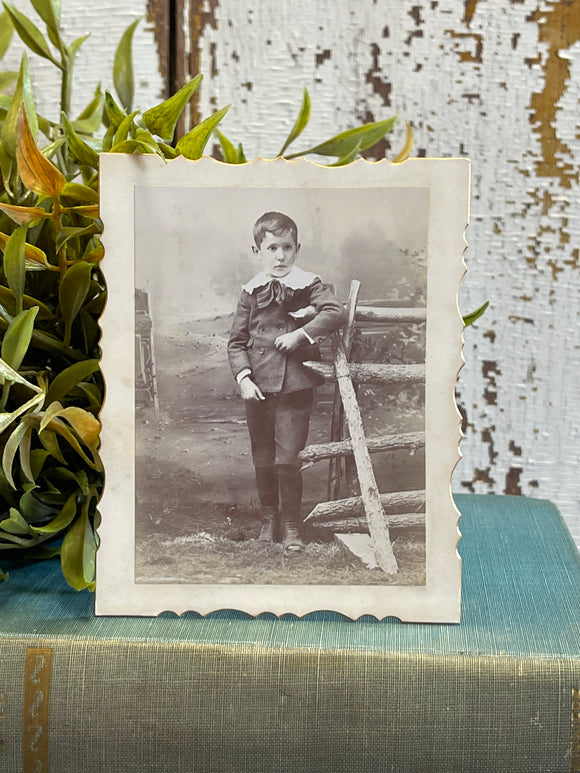 Antique Card Photo of Boy Leaning on Fence