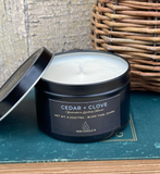 Cedar + Clove 6oz Soy Candle in Black Travel Tin