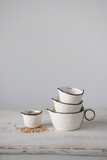 White Stoneware Measuring Cup Set w/ Black Rim